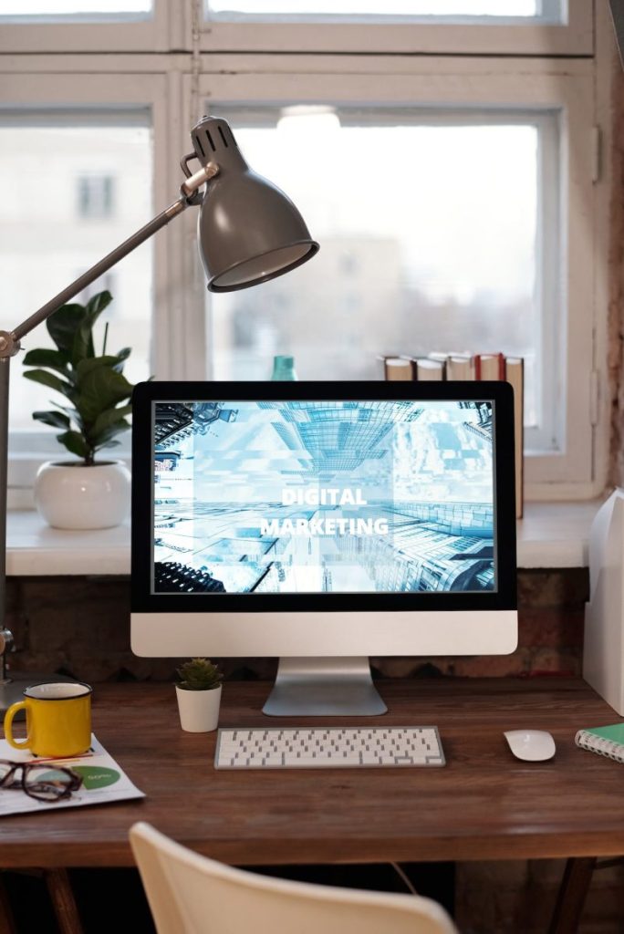 Silver Imac on Brown Wooden Table for US Virgin Islands Website Design and Marketing